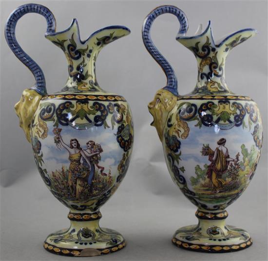 A pair of French faience ewers, late 19th / early 20th century 30cm